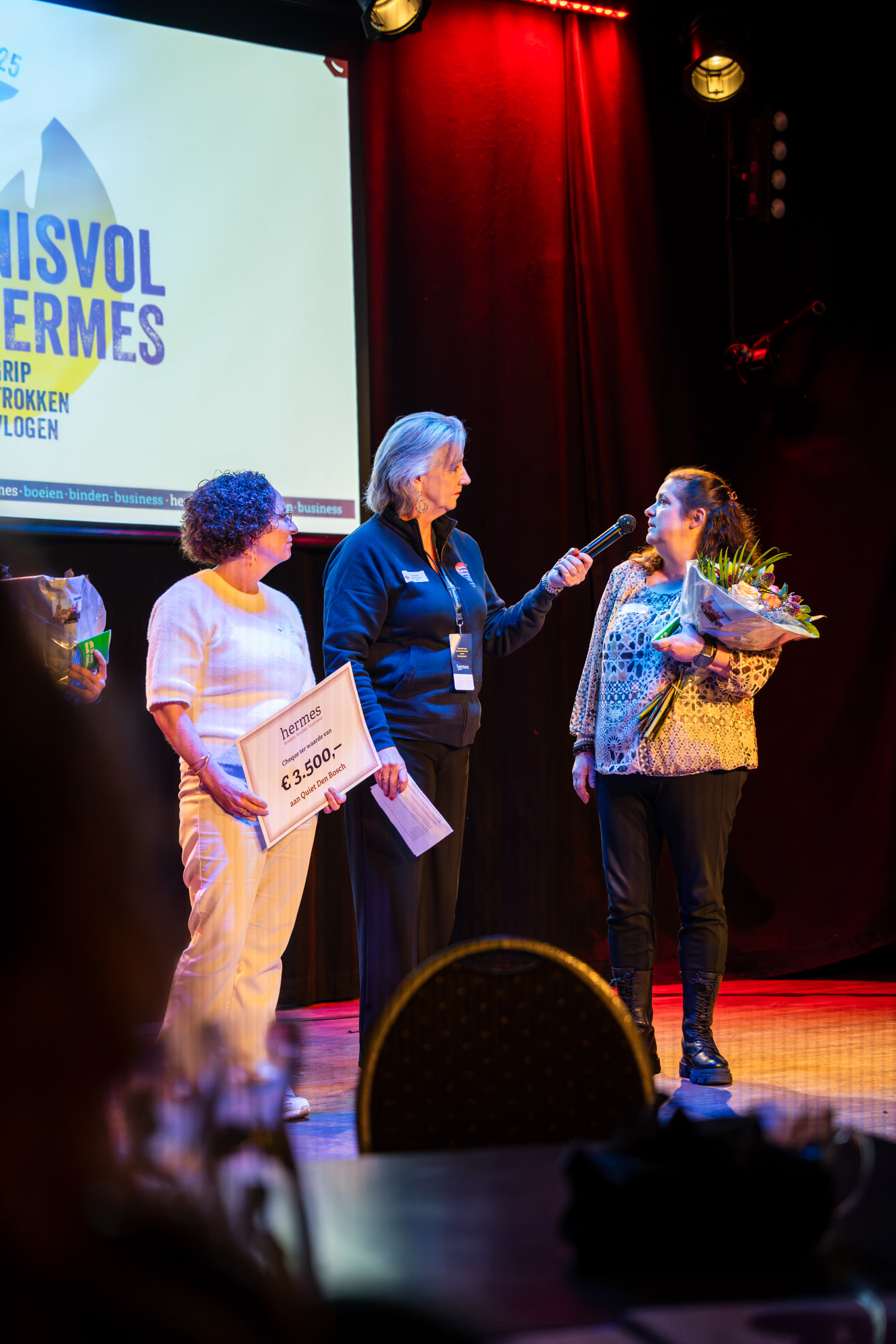 Spreker op het podium tijdens Hermes Inspiratiedag